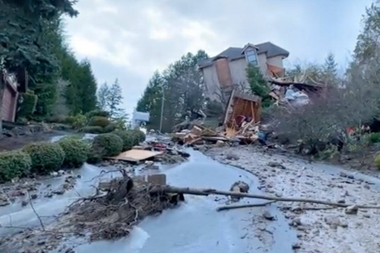 Broken water main causes Bellevue home to slide off of its foundation and collapse